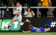 28 March 2025; Zac Ward of Ulster gets away from Paul de Wet of DHL on his way scoring his sides fifth try during the United Rugby Championship match between Ulster and DHL Stormers at the Kingspan Stadium in Belfast. Photo by John Dickson/Sportsfile
