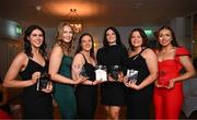 28 March 2025; DCU Dóchas Éireann players, from left to right, Caoimhe Boyle, Emily Hevey, Riane McGrath, Niamh McCorry, Áine Smith and Sarah Boyd with their AIG Ladies HEC Rising Stars 2025 award at the 2025 AIG Ladies HEC All-Stars and Rising Stars evening, at the Dublin Bonnington Hotel. Photo by Ramsey Cardy/Sportsfile