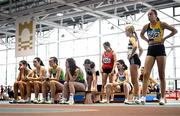 29 March 2025; Competitors in the Girls U17 200m await to be called to the starting blocks during day one of the 123.ie National Indoor Juvenile Championships at the TUS Indoor Arena in Athlone, Westmeath. Photo by Ben McShane/Sportsfile