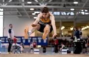 29 March 2025; Darragh Fahy of Loughrea AC, Galway, competes in the Boys U19 Triple Jump during day one of the 123.ie National Indoor Juvenile Championships at the TUS Indoor Arena in Athlone, Westmeath. Photo by Ben McShane/Sportsfile