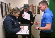 29 March 2025; Referee Brian Keon receives the team sheets from Kildare secretary Christine Murray and Down secretary Sean Óg McAteer ahead of the Allianz Hurling League Division 2 final match between Down and Kildare at Grattan Park in Inniskeen, Monaghan. Photo by Daire Brennan/Sportsfile