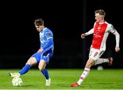 28 March 2025; Dean McMenamy of Waterford in action against Chris Forrester of St Patrick's Athletic during the SSE Airtricity Men's Premier Division match between Waterford and St Patrick's Athletic at the Regional Sports Centre in Waterford. Photo by Michael P Ryan/Sportsfile