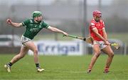 29 March 2025; Sean Flynn of Louth in action against Odhran Johnston of Fermanagh during the Allianz Hurling League Division 4 final match between Fermanagh and Louth at St Mellans Park in Truagh, Monaghan. Photo by Stephen Marken/Sportsfile