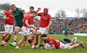 29 March 2025; Munster players, including Craig Casey, Gavin Coombes, Jack Crowley and John Hodnett, celebrate their side's first try, scored by Tom Ahern, right, during the United Rugby Championship match between Connacht and Munster at Hastings Insurance MacHale Park in Castlebar, Mayo. Photo by Seb Daly/Sportsfile