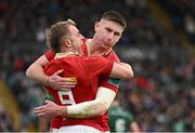 29 March 2025; Craig Casey of Munster celebrates with teammate Ben O'Connor after scoring their side's second try during the United Rugby Championship match between Connacht and Munster at Hastings Insurance MacHale Park in Castlebar, Mayo. Photo by Seb Daly/Sportsfile