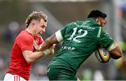 29 March 2025; Craig Casey of Munster attempts to tackle Bundee Aki of Connacht during the United Rugby Championship match between Connacht and Munster at Hastings Insurance MacHale Park in Castlebar, Mayo. Photo by Seb Daly/Sportsfile