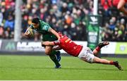 29 March 2025; Josh Ioane of Connacht is tackled by John Hodnett of Munster during the United Rugby Championship match between Connacht and Munster at Hastings Insurance MacHale Park in Castlebar, Mayo. Photo by Tyler Miller/Sportsfile