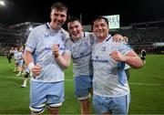 29 March 2025; Leinster players, from left, Alan Spicer, Diarmuid Mangan and Thomas Clarkson celebrate after the the United Rugby Championship match between Hollywoodbets Sharks and Leinster at Hollywoodbets Kings Park in Durban, South Africa. Photo by Shaun Roy/Sportsfile