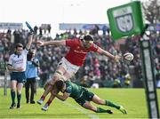 29 March 2025; Tom Ahern of Munster is tackled by Santiago Cordero of Connacht during the United Rugby Championship match between Connacht and Munster at Hastings Insurance MacHale Park in Castlebar, Mayo. Photo by Seb Daly/Sportsfile