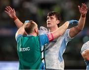 29 March 2025; Brian Deeny of Leinster receives medical attention from lead academy physiotherapist Darren Hickey during the United Rugby Championship match between Hollywoodbets Sharks and Leinster at Hollywoodbets Kings Park in Durban, South Africa. Photo by Shaun Roy/Sportsfile