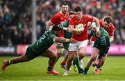 29 March 2025; Calvin Nash of Munster is tackled by Bundee Aki of Connacht during the United Rugby Championship match between Connacht and Munster at Hastings Insurance MacHale Park in Castlebar, Mayo. Photo by Seb Daly/Sportsfile