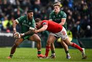 29 March 2025; Bundee Aki of Connacht is tackled by Tom Farrell of Munster during the United Rugby Championship match between Connacht and Munster at Hastings Insurance MacHale Park in Castlebar, Mayo. Photo by Seb Daly/Sportsfile
