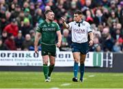 29 March 2025; Referee Craig Evans in conversation with JJ Hanrahan of Connacht after disallowing a try during the United Rugby Championship match between Connacht and Munster at Hastings Insurance MacHale Park in Castlebar, Mayo. Photo by Seb Daly/Sportsfile