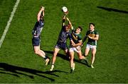 30 March 2025; Matthew Ruane, left, and Jack Carney of Mayo in action against Mike Breen, left, and Paudie Clifford of Kerry during the Allianz Football League Division 1 final match between Kerry and Mayo at Croke Park in Dublin. Photo by Daire Brennan/Sportsfile