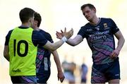 30 March 2025; Matthew Ruane of Mayo, right, shakes hands with team-mate Davitt Neary after their side's defeat in the Allianz Football League Division 1 final match between Kerry and Mayo at Croke Park in Dublin. Photo by Shauna Clinton/Sportsfile