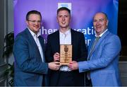31 March 2025; DCU Dóchas Éireann player Joe Flanagan, centre, is presented with his 2025 Electric Ireland Higher Education GAA Hurling Rising Stars Team of the Year award by Electric Ireland Group Sponsorship & PR Manager Rob Crabbe, left, and Higher Education GAA Chairperson Benny Hurl during the Electric Ireland Higher Education Rising Stars Awards at Castleknock Hotel in Dublin. Photo by Shauna Clinton/Sportsfile