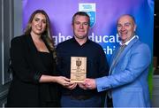 31 March 2025; Skerries Harps Chairman Martin Kenny, centre, accepts the 2025 Electric Ireland Higher Education GAA Football Rising Stars Team of the Year award on behalf of DCU Dóchas Éireann player Eoghan O’Connor Flanagan, not pictured, from Electric Ireland Sponsorship Manager Sarah Gelletlie, left, and Higher Education GAA Chairperson Benny Hurl during the Electric Ireland Higher Education Rising Stars Awards at Castleknock Hotel in Dublin. Photo by Shauna Clinton/Sportsfile