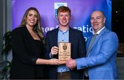 31 March 2025; University College Dublin player Ryan O’Toole, centre, is presented with his 2025 Electric Ireland Higher Education GAA Football Rising Stars Team of the Year award by Electric Ireland Sponsorship Manager Sarah Gelletlie, left, and Higher Education GAA Chairperson Benny Hurl during the Electric Ireland Higher Education Rising Stars Awards at Castleknock Hotel in Dublin. Photo by Shauna Clinton/Sportsfile