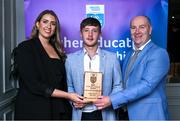 31 March 2025; Jonny Dunne, centre, brother of DCU Dóchas Éireann player Ethan Dunne, not pictured, accepts the 2025 Electric Ireland Higher Education GAA Football Rising Stars Team of the Year award on behalf of his brother, from Electric Ireland Sponsorship Manager Sarah Gelletlie, left, and Higher Education GAA Chairperson Benny Hurl during the Electric Ireland Higher Education Rising Stars Awards at Castleknock Hotel in Dublin. Photo by Shauna Clinton/Sportsfile