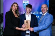 31 March 2025; DCU Dóchas Éireann player Tom Prior, centre, is presented with his 2025 Electric Ireland Higher Education GAA Football Rising Stars Team of the Year award by Electric Ireland Sponsorship Manager Sarah Gelletlie, left, and Higher Education GAA Chairperson Benny Hurl during the Electric Ireland Higher Education Rising Stars Awards at Castleknock Hotel in Dublin. Photo by Shauna Clinton/Sportsfile