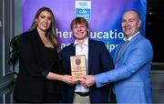 31 March 2025; University College Dublin player Cormac Egan, centre, is presented with his 2025 Electric Ireland Higher Education GAA Football Rising Stars Team of the Year award by Electric Ireland Sponsorship Manager Sarah Gelletlie, left, and Higher Education GAA Chairperson Benny Hurl during the Electric Ireland Higher Education Rising Stars Awards at Castleknock Hotel in Dublin. Photo by Shauna Clinton/Sportsfile