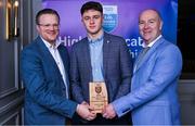31 March 2025; University College Cork player Ciaran Doolin, centre, is presented with his 2025 Electric Ireland Higher Education GAA Hurling Rising Stars Team of the Year award by Electric Ireland Group Sponsorship & PR Manager Rob Crabbe, left, and Higher Education GAA Chairperson Benny Hurl during the Electric Ireland Higher Education Rising Stars Awards at Castleknock Hotel in Dublin. Photo by Shauna Clinton/Sportsfile
