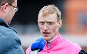 29 March 2025; Jockey Billy Lee is interviewed by RTÉ at The Curragh Racecourse in Kildare. Photo by Thomas Doolin/Sportsfile