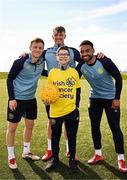 2 April 2025; All in Against Cancer: St Patrick's Athletic superfan Caiden Molloy, centre, meets heroes, from left, Brandon Kavanagh, Chris Forrester and Jake Mulraney to mark Daffodil Day. To support the Irish Cancer Society’s free supports and service, please donate at cancer.ie/daffodilday. Photo by Sam Barnes/Sportsfile