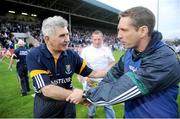25 July 2009; Kildare manager Kieran McGeeney is congratulated by Wicklow manager Mick O'Dwyer. GAA All-Ireland Senior Football Championship Qualifier, Round 4, Kildare v Wicklow, O'Moore Park, Portlaoise, Co. Laois. Picture credit: Matt Browne / SPORTSFILE