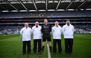 29 March 2025; Referee Seamus Mulhare and his officials, line umpires Fergal Kelly and Andrew Smith, sideline official Paddy McDermott, and score umpires Phil Keogh, Séamus Lalor, Chris Grehan and Ger Keane, before the Allianz Football League Division 4 final match between Wexford and Limerick at Croke Park in Dublin. Photo by Ramsey Cardy/Sportsfile