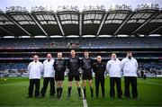 29 March 2025; Referee Seamus Mulhare and his officials, line umpires Fergal Kelly and Andrew Smith, sideline official Paddy McDermott, and score umpires Phil Keogh, Séamus Lalor, Chris Grehan and Ger Keane, before the Allianz Football League Division 4 final match between Wexford and Limerick at Croke Park in Dublin. Photo by Ramsey Cardy/Sportsfile