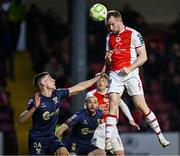 4 April 2025; Sean Hoare of St Patrick's Athletic in action against Lewis Temple of Shelbourne during the SSE Airtricity Men's Premier Division match between St Patrick's Athletic and Shelbourne at Richmond Park in Dublin. Photo by Seb Daly/Sportsfile