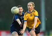 13 March 2025; Aobha Harmon of DCU Dóchas Éireann in action against Brenna O Neill of TUD during the 2025 AIG Moynihan Cup final match between TUD CC1 and DCU Dóchas Éireann at Queen's Sport in Belfast. Photo by Shauna Clinton/Sportsfile