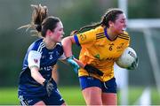 13 March 2025; Tara McAneena of DCU Dóchas Éireann in action against Shauna Higgins of UU Coleraine during the 2025 AIG HEC Cup final match between UU Coleraine and DCU Dóchas Éireann at Queen's University in Belfast. Photo by Shauna Clinton/Sportsfile