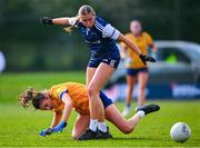 13 March 2025; Caoimhe Doherty of UU Coleraine  in actioin against Laura Grimes of DCU Dóchas Éireann during the 2025 AIG HEC Cup final match between UU Coleraine and DCU Dóchas Éireann at Queen's University in Belfast. Photo by Shauna Clinton/Sportsfile