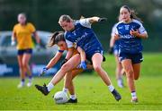 13 March 2025; Caoimhe Doherty of UU Coleraine  in actioin against Laura Grimes of DCU Dóchas Éireann during the 2025 AIG HEC Cup final match between UU Coleraine and DCU Dóchas Éireann at Queen's University in Belfast. Photo by Shauna Clinton/Sportsfile