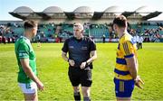 5 April 2025; Referee Thomas Murphy with team captains Eoin Walsh of London, left, and Diarmuid Murtagh of Roscommon before the Connacht GAA Football Senior Championship quarter-final match between London and Roscommon at McGovern Park in Ruislip, England. Photo by Ben McShane/Sportsfile