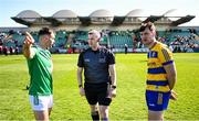 5 April 2025; Referee Thomas Murphy with team captains Eoin Walsh of London, left, and Diarmuid Murtagh of Roscommon before the Connacht GAA Football Senior Championship quarter-final match between London and Roscommon at McGovern Park in Ruislip, England. Photo by Ben McShane/Sportsfile