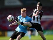 5 April 2025; Sean Og Madden of Midleton FC in action against Lewis Bruton of Belvedere FC during the FAI Under 17 Cup final match between Midleton FC and Belvedere FC at Turners Cross Stadium in Cork. Photo by Michael P Ryan/Sportsfile