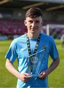 5 April 2025; Jamie Brennan of Belvedere FC with his player of the match award after the FAI Under 17 Cup final match between Midleton FC and Belvedere FC at Turners Cross Stadium in Cork. Photo by Michael P Ryan/Sportsfile