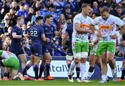 5 April 2025; Ross Byrne of Leinster, 22, is congratulated by teammates Jamie Osborne and Jordie Barrett after scoring their side's eighth try during the Investec Champions Cup Round of 16 match between Leinster and Harlequins at Croke Park in Dublin. Photo by Brendan Moran/Sportsfile