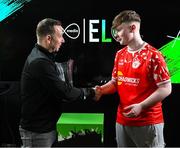 5 April 2025; League of Ireland director Mark Scanlon presents the trophy to JP Sleator of Shelbourne after the ELOI Finals at the Aviva Stadium, Dublin. Photo by David Fitzgerald/Sportsfile