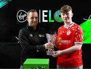 5 April 2025; League of Ireland director Mark Scanlon presents the trophy to JP Sleator of Shelbourne after the ELOI Finals at the Aviva Stadium, Dublin. Photo by David Fitzgerald/Sportsfile