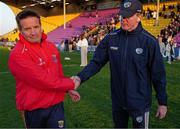 5 April 2025; Wexford manager John Hegarty and Laois manager Justin McNulty after the Leinster GAA Football Senior Championship round one match between Wexford and Laois at Chadwicks Wexford Park in Wexford. Photo by Ray McManus/Sportsfile