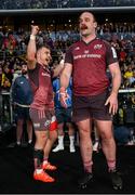 5 April 2025; Craig Casey, left, and Oli Jager of Munster celebrate in the final moments of the Investec Champions Cup Round of 16 match between La Rochelle and Munster at Stade Marcel Deflandre in La Rochelle, France. Photo by Ramsey Cardy/Sportsfile