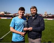 5 April 2025; FAI vice-president John Finnegan presents the player of the match award to Jamie Brennan of Belvedere FC after the FAI Under 17 Cup final match between Midleton FC and Belvedere FC at Turners Cross Stadium in Cork. Photo by Michael P Ryan/Sportsfile