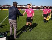 5 April 2025; FAI vice-president John Finnegan presents referee Shane O'Donoghue with his medal after the FAI Under 17 Cup final match between Midleton FC and Belvedere FC at Turners Cross Stadium in Cork. Photo by Michael P Ryan/Sportsfile