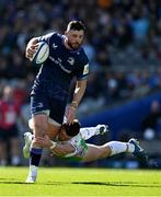 5 April 2025; Robbie Henshaw of Leinster is tackled by Ben Waghorn of Harlequins during the Investec Champions Cup Round of 16 match between Leinster and Harlequins at Croke Park in Dublin. Photo by Brendan Moran/Sportsfile
