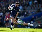 5 April 2025; Robbie Henshaw of Leinster is tackled by Ben Waghorn of Harlequins during the Investec Champions Cup Round of 16 match between Leinster and Harlequins at Croke Park in Dublin. Photo by Brendan Moran/Sportsfile