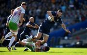 5 April 2025; Robbie Henshaw of Leinster is tackled by Ben Waghorn of Harlequins during the Investec Champions Cup Round of 16 match between Leinster and Harlequins at Croke Park in Dublin. Photo by Brendan Moran/Sportsfile
